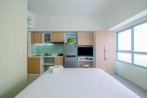 Functional and Minimalist Studio Apartment at Springlake Summarecon By Travelio