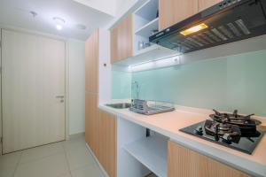 Functional and Minimalist Studio Apartment at Springlake Summarecon By Travelio