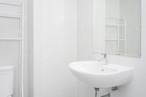 Homey and Cozy Studio Casa De Parco Apartement By Travelio