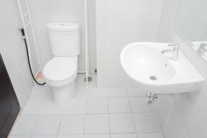 Homey and Cozy Studio Casa De Parco Apartement By Travelio