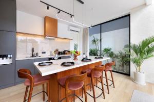 The Oasis II Townhouses by BREIG