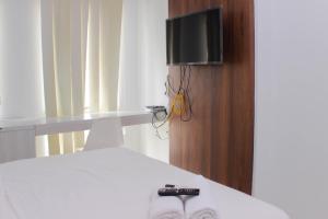 Great Location Studio Room at Patraland Urbano Apartment By Travelio