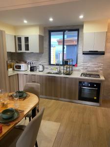 classy executive two bedroom apartment with fully equipped gym ample parking space heated swimming pool children playing ground and amazing scenic views