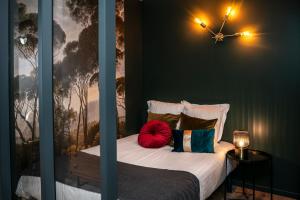 Appartements ONLOC - Le Romantique appart proche centre ville - Parking : photos des chambres