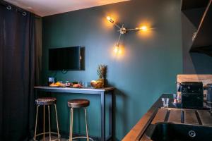Appartements ONLOC - Le Romantique appart proche centre ville - Parking : photos des chambres