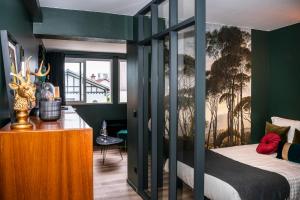 Appartements ONLOC - Le Romantique appart proche centre ville - Parking : photos des chambres