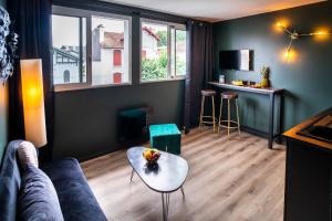 Appartements ONLOC - Le Romantique appart proche centre ville - Parking : photos des chambres