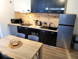 Appartements Appart'hotel SOLESMES : photos des chambres