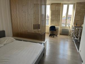 Appartements Le Contemporain : photos des chambres