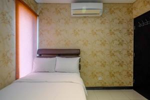 Comfort and Homey 2BR at Nifarro Park Apartment By Travelio