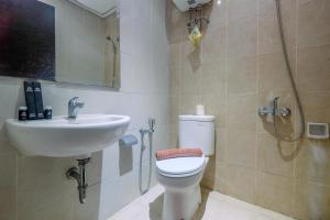 Comfort and Homey 2BR at Nifarro Park Apartment By Travelio