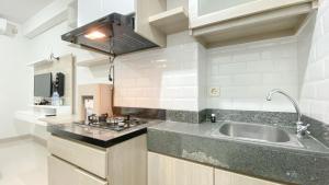 Great Deal and Simply Studio at Transpark Cibubur Apartment By Travelio