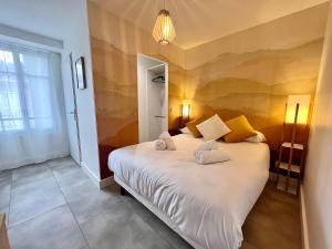Appartements Le PRESTIGE du SANCTUAIRE : photos des chambres