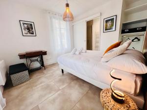 Appartements Le PRESTIGE du SANCTUAIRE : photos des chambres