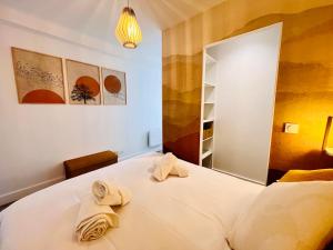Appartements Le PRESTIGE du SANCTUAIRE : photos des chambres