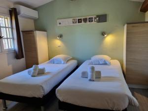 Villages vacances Les Garrigues de la Vallee des Baux : photos des chambres