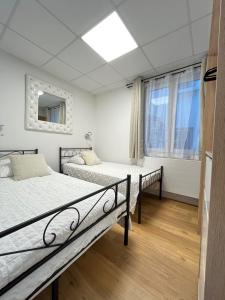 Appartements Residence Harmony : Appartement - Rez-de-Chaussée