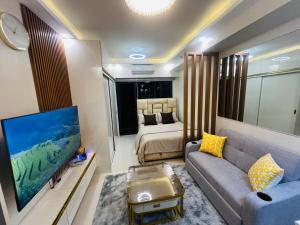 Modern Makati Condo with Balcony & Cityscape Views