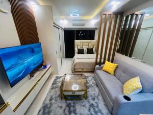 Modern Makati Condo with Balcony & Cityscape Views