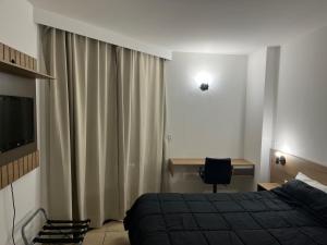 Flat Santos frente mar Canal 3