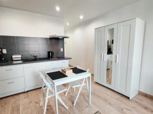 Appartements Le Secret du Clocher : photos des chambres
