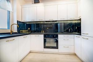 City Break Apartment z gabinetem, 2 łazienkami, tarasem i garażem podziemnym w cenie