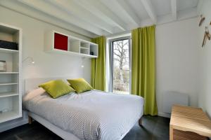 Maisons de vacances Belle Ville - Maison lumineuse, cadre verdoyant : photos des chambres
