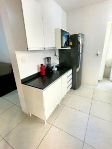 Apartamento 700m Praia Itaguá.Garagem.Ar condic