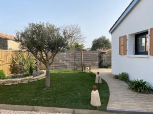 Maisons de vacances Charming house - Grand Village Plage : photos des chambres