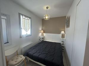 Appartement 2 pièces avec balcon et parking privé - FR-1-224B-71