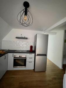 Appartements L-appartement de la fontaine : photos des chambres