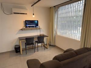 09 - Estúdio na Savassi com Ar condicionado, Cozinha completa, Vaga de garagem, próximo ao Life Center