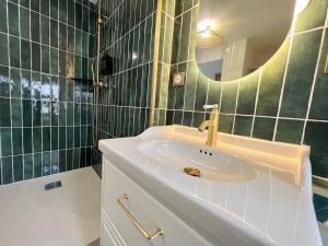 Maisons de vacances Villa Verde, magnifique gite a 10 min du Futuroscope : photos des chambres