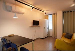 12 - ESTÚDIO CHARMOSO, Ar condicionado, Cozinha completa, Vaga de garagem