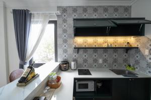 N Queen Apartment Hotel