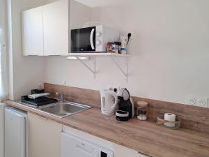 Appartements Studio 3 Cozy Proche du centre ville : photos des chambres
