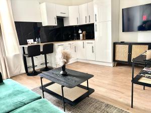 Appartements Eleven Arene BY PRIMO C0NCIERGERIE : photos des chambres