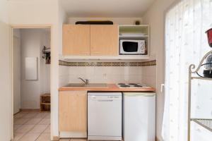 Maisons de vacances Villa climatisee avec piscine : photos des chambres