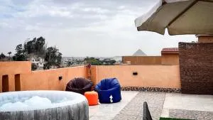 Boho Getaway with Pyramids View & Jacuzzi - Kafr Abū ʼumaydah