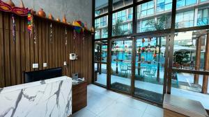 Sunny Hall - Loft Sofisticado em Porto de Galinhas (CM) por Yolo