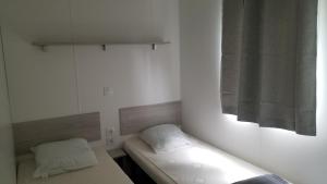 Mobile home 6P XL Climatisation TV WIFI parcelle XXL au calme