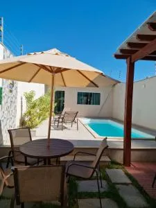 Ivana Imoveis - Casa com Piscina na Praia do Morro á 2 minutos da praia - Peroção