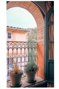 Appartements Le Petit Balcon Bleu : photos des chambres