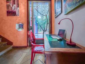 Appartements Chez Jeanine - Charmant T3 avec patio fleuri : photos des chambres