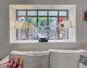 Appartements Chez Jeanine - Charmant T3 avec patio fleuri : photos des chambres