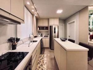 Apto Luxo - Living Atlântida