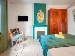 Appartements Chez Jeanine - Charmant T3 avec patio fleuri : photos des chambres