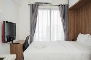 Cozy Living Studio Sky House BSD Apartment By Travelio