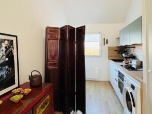 Appartements Appartement neuf avec terrasse et parking a Groix - FR-1-813-23 : photos des chambres