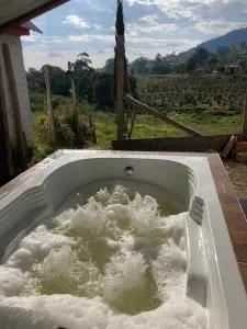 Campo, aire puro, luciérnagas, jacuzzi, Sauna y Asador - Pasca